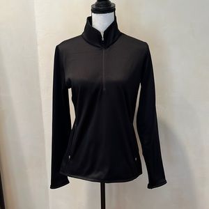 - Nike Women’s Therma-Fit 3/4 Zip pullover.